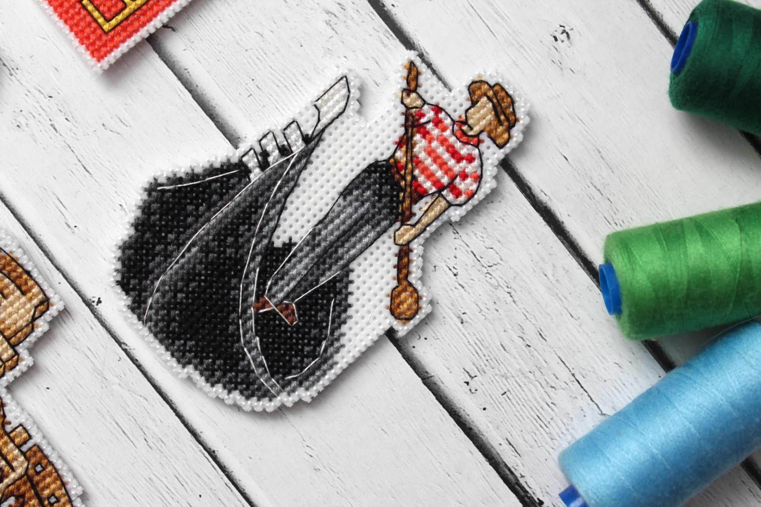 Italy Magnets P-309 / SR-309 Cross Stitch Kit featuring colorful threads and plastic canvas for crafting.